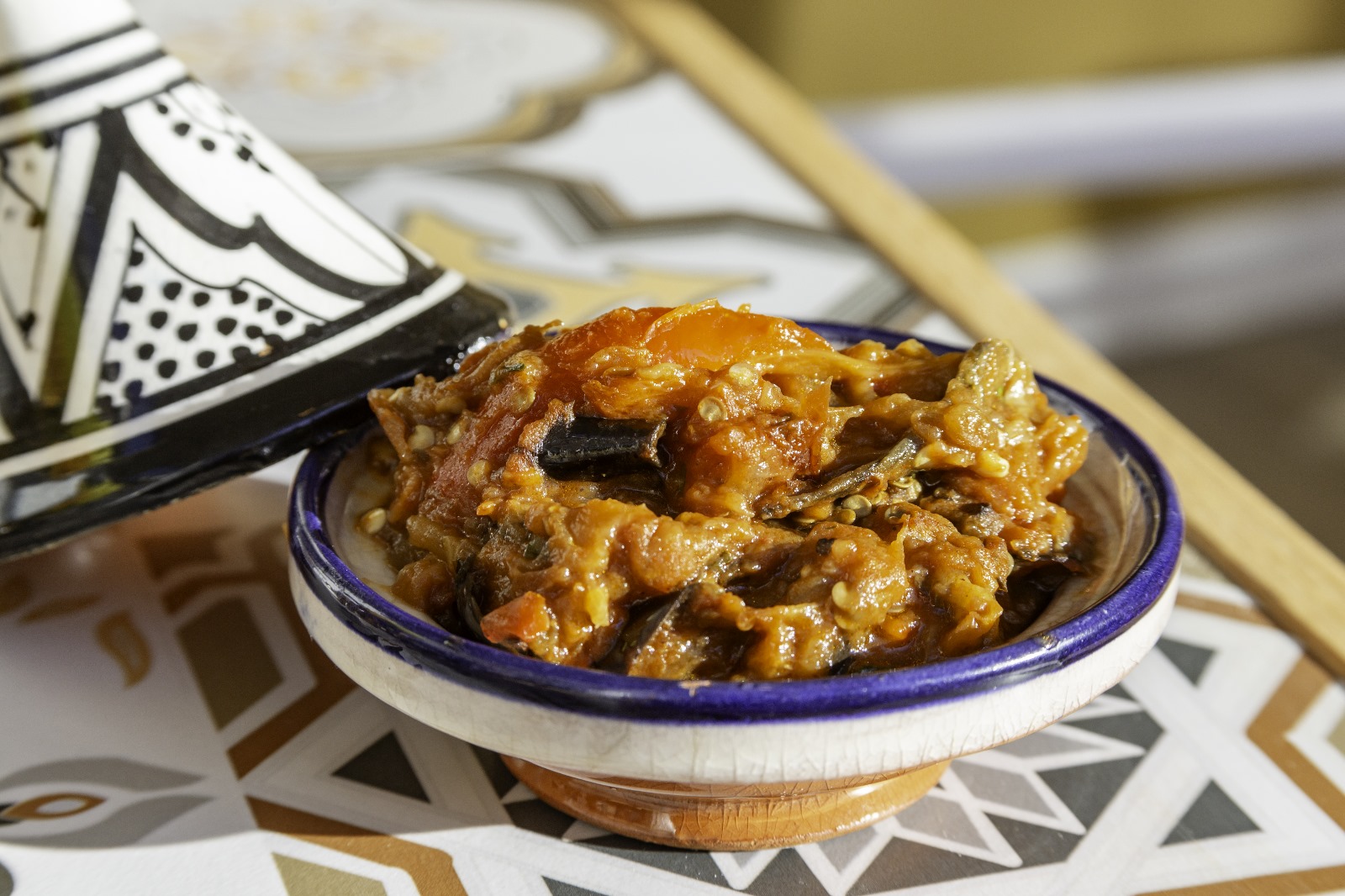 A Moroccan dish served in traditional ceramic tableware at Sofi Corner Café